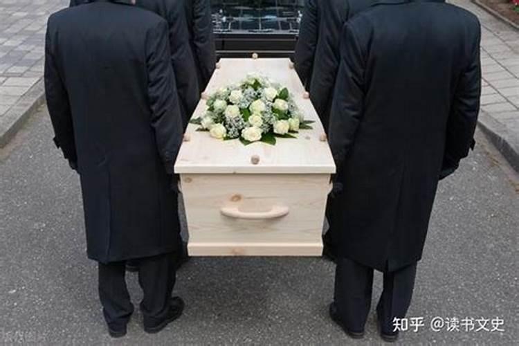 梦见父亲死了放在棺材里准备出葬
